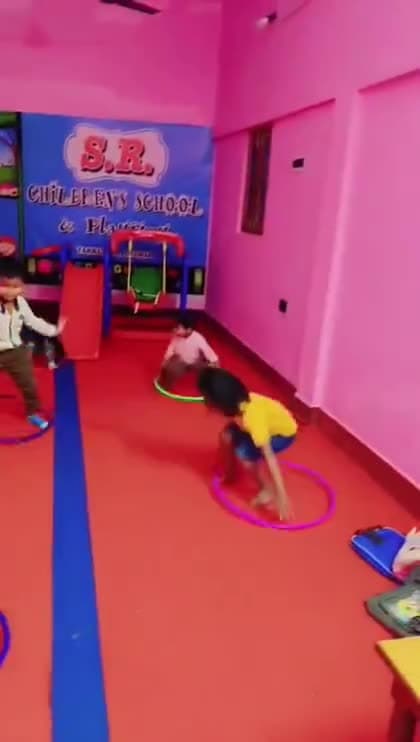 A child participating in an indoor play activity at school