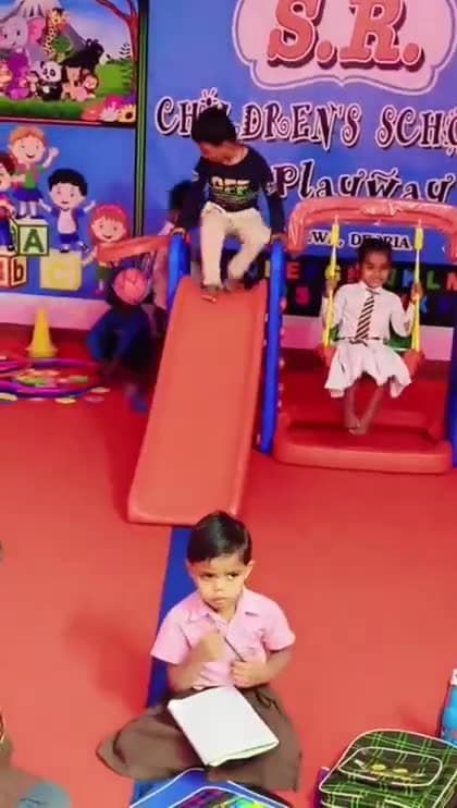 Children taking part in a play activity at school