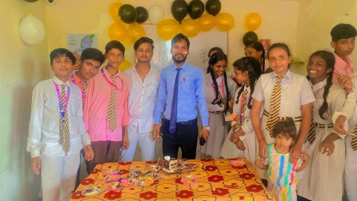 Students and staff at a school celebration