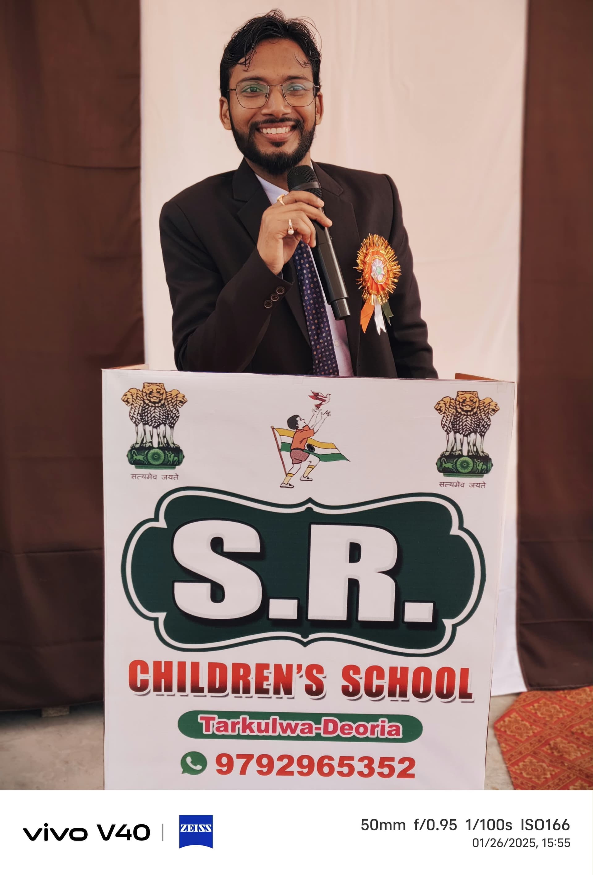 The principal speaking during a school function