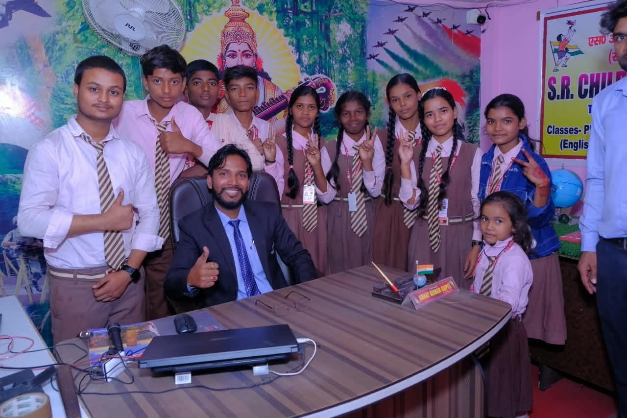 The principal with students at S.R. Children's School in Tarkulwa, Deoria