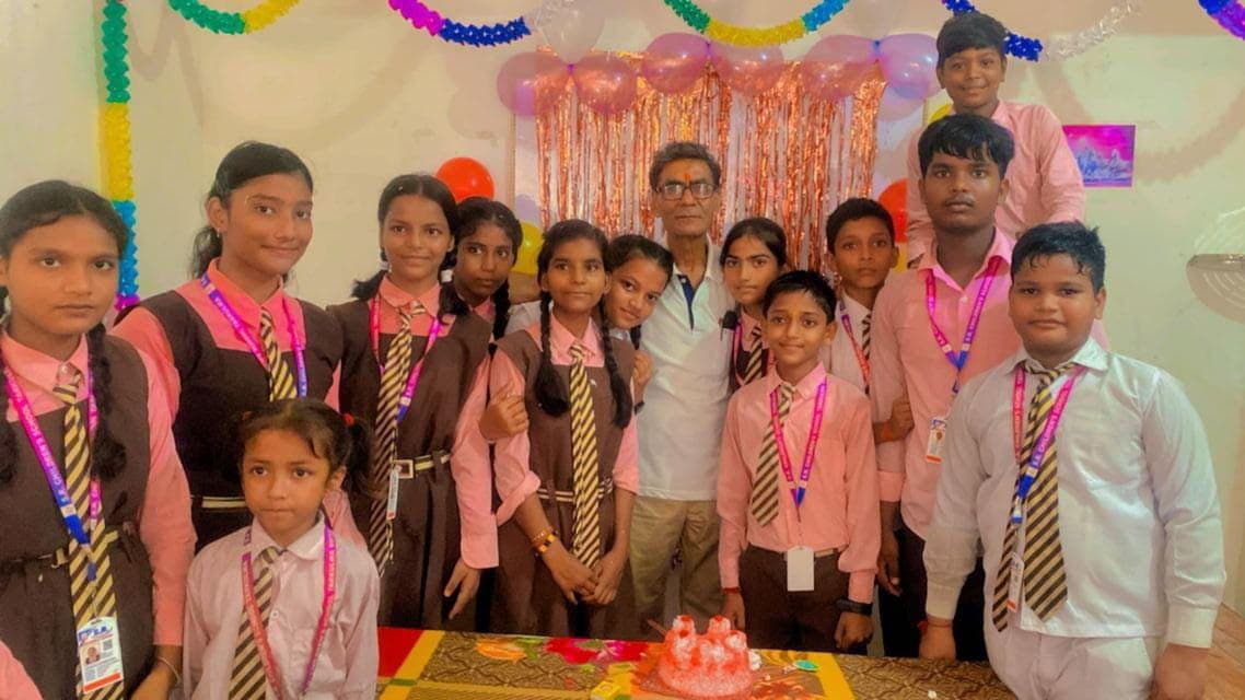 Students gathered with teachers at a school function